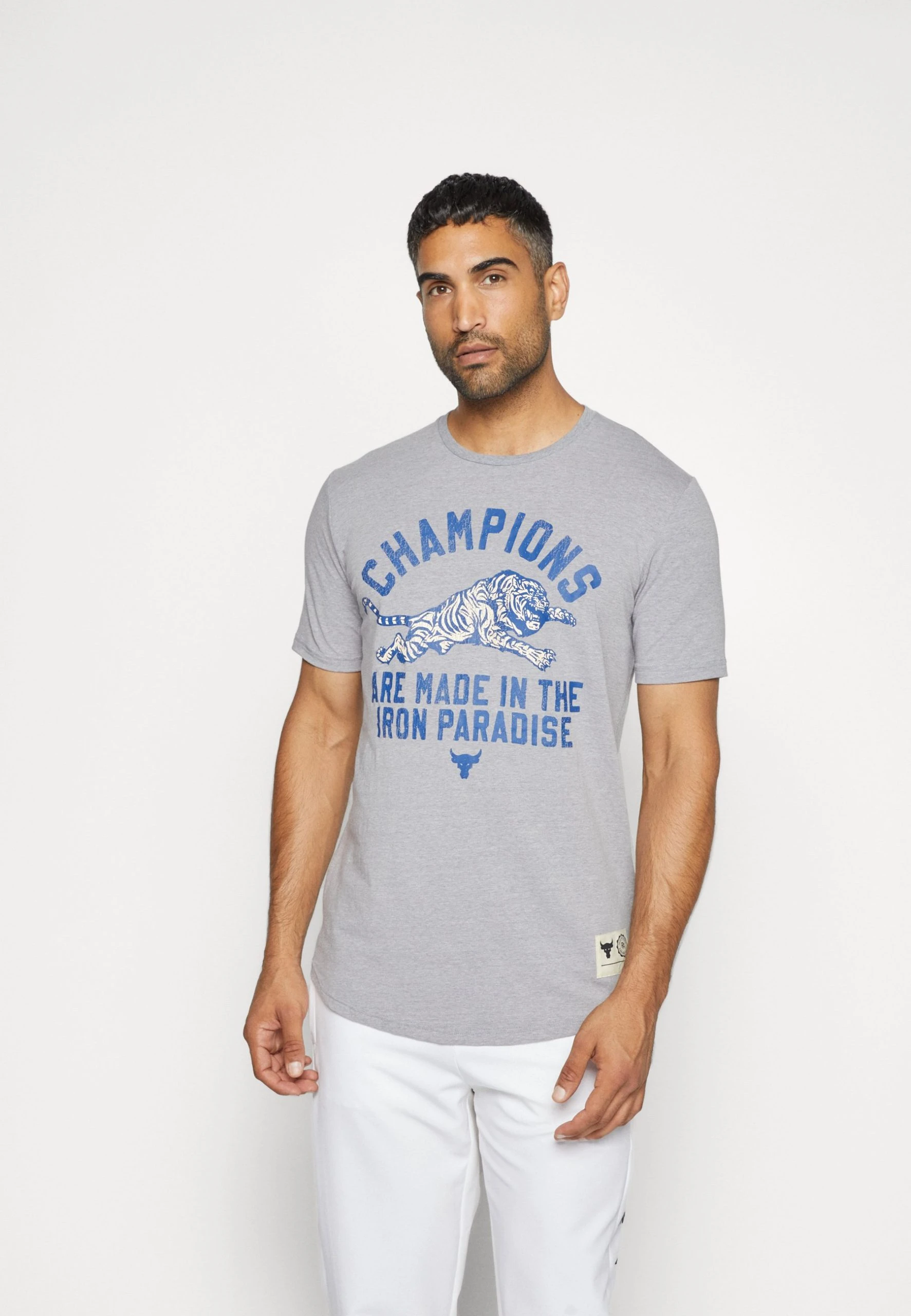 ROCK CHAMP - T-shirt z nadrukiem - steel light heather/blue mirage Under Armour ROCK CHAMP - T-shirt Z Nadrukiem - Steel Light Heather/blue Mirage -Under Armour shop 02f4dd7925174a57b230fbee59c6d630 scaled