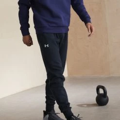 Under Armour RIVAL JOGGERS - Spodnie Treningowe - Black/white