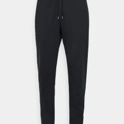 Under Armour ESSENTIAL - Spodnie Treningowe - Black/white 3 Under Armour ESSENTIAL - Spodnie Treningowe - Black/white -Under Armour shop 16d0cfee96ce4c16932d352025018fb9 scaled