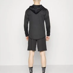 Under Armour BASELINE 10IN - Krótkie Spodenki Sportowe - Black -Under Armour shop 1a2e9971b5074aa396cbd877cef8b2d4 scaled