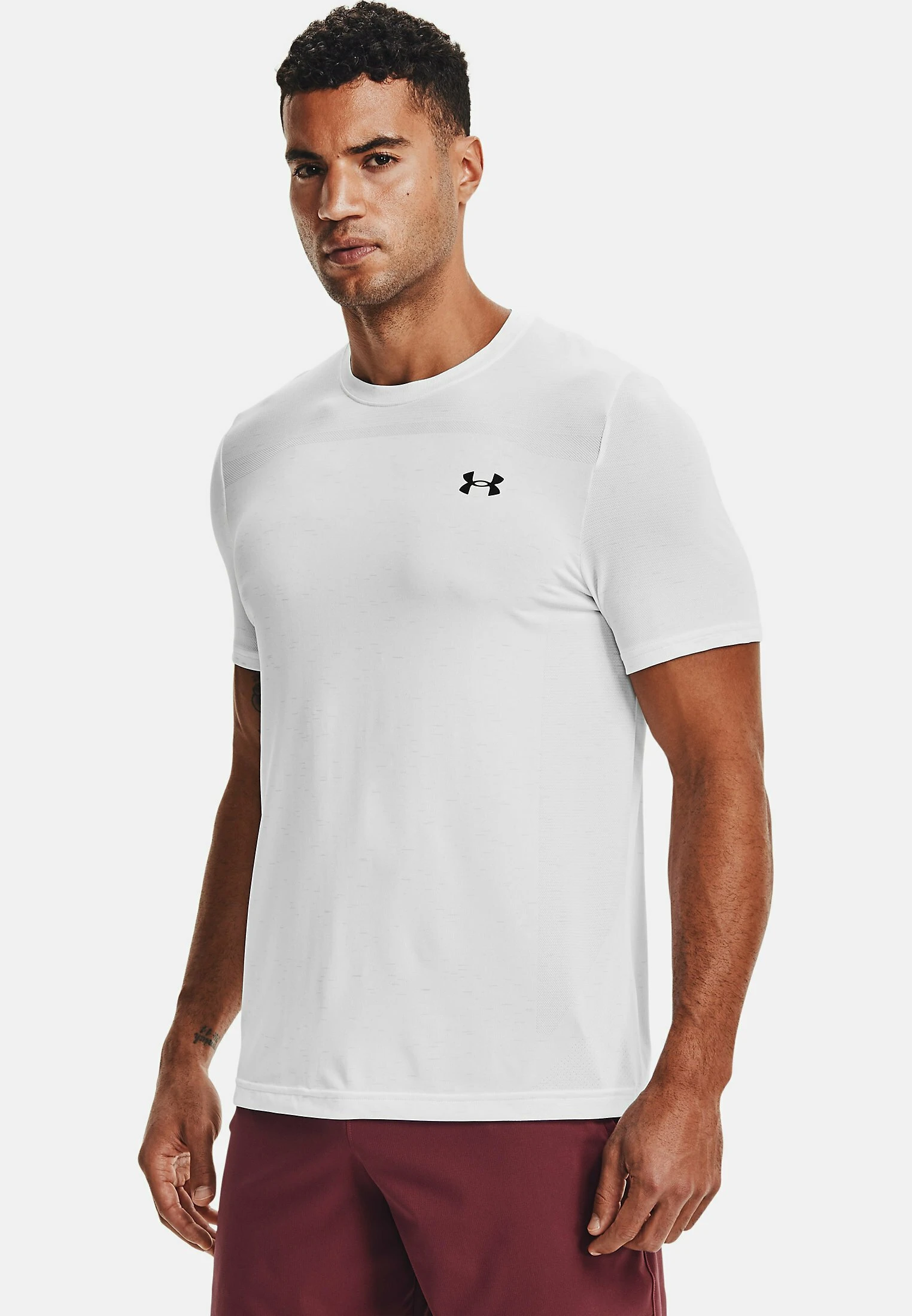 Under Armour SEAMLESS - T-shirt Z Nadrukiem - White 1 Under Armour SEAMLESS - T-shirt Z Nadrukiem - White