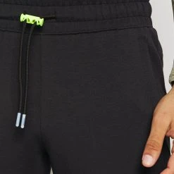 Under Armour SUMMIT - Spodnie Treningowe - Black/white -Under Armour shop 30c52938be234a89942461e0471dac36 scaled