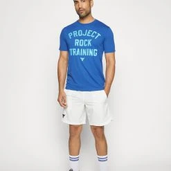 Under Armour ROCK TRAINING - T-shirt Z Nadrukiem - Blue Mirage/blue Surf -Under Armour shop 32fa4fb340a24d9eaed865f2511f4196 scaled