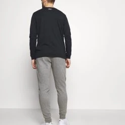 Under Armour RIVAL JOGGERS - Spodnie Treningowe - Pitch Gray Light Heather -Under Armour shop 3cfc7b25b5e54c8fb6a87838c968d8d5 scaled