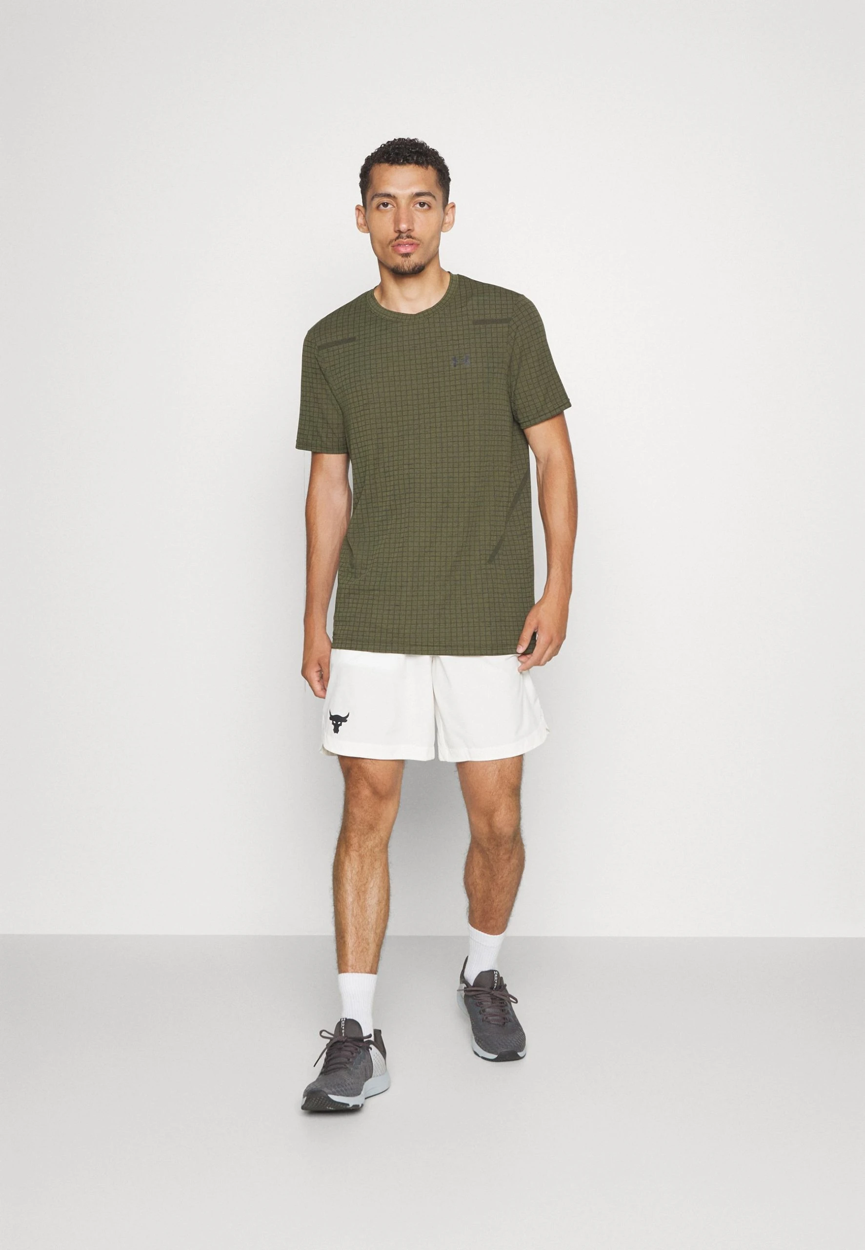 SEAMLESS GRID - Koszulka sportowa - marine green/black Under Armour SEAMLESS GRID - Koszulka Sportowa - Marine Green/black -Under Armour shop 4e762a60b38f43afac9836fcaefe0641 scaled