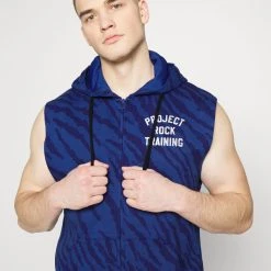 Under Armour RIVAL - Bluza Z Kapturem - Blue Mirage -Under Armour shop 59d44ecde71048838bbb0c0f03329b53 scaled