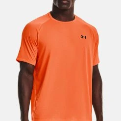 Under Armour NOVELTY TECH 2.0 TRAININGS - T-shirt Z Nadrukiem - Orange Blast