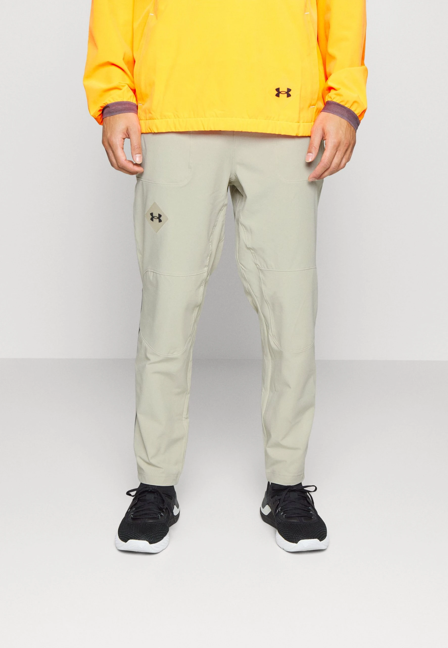 TERRAIN ANKLE PANTS - Długie spodnie trekkingowe - khaki base/black Under Armour TERRAIN ANKLE PANTS - Długie Spodnie Trekkingowe - Khaki Base/black -Under Armour shop 7875bfc25e24444d85de652246b5d76b scaled