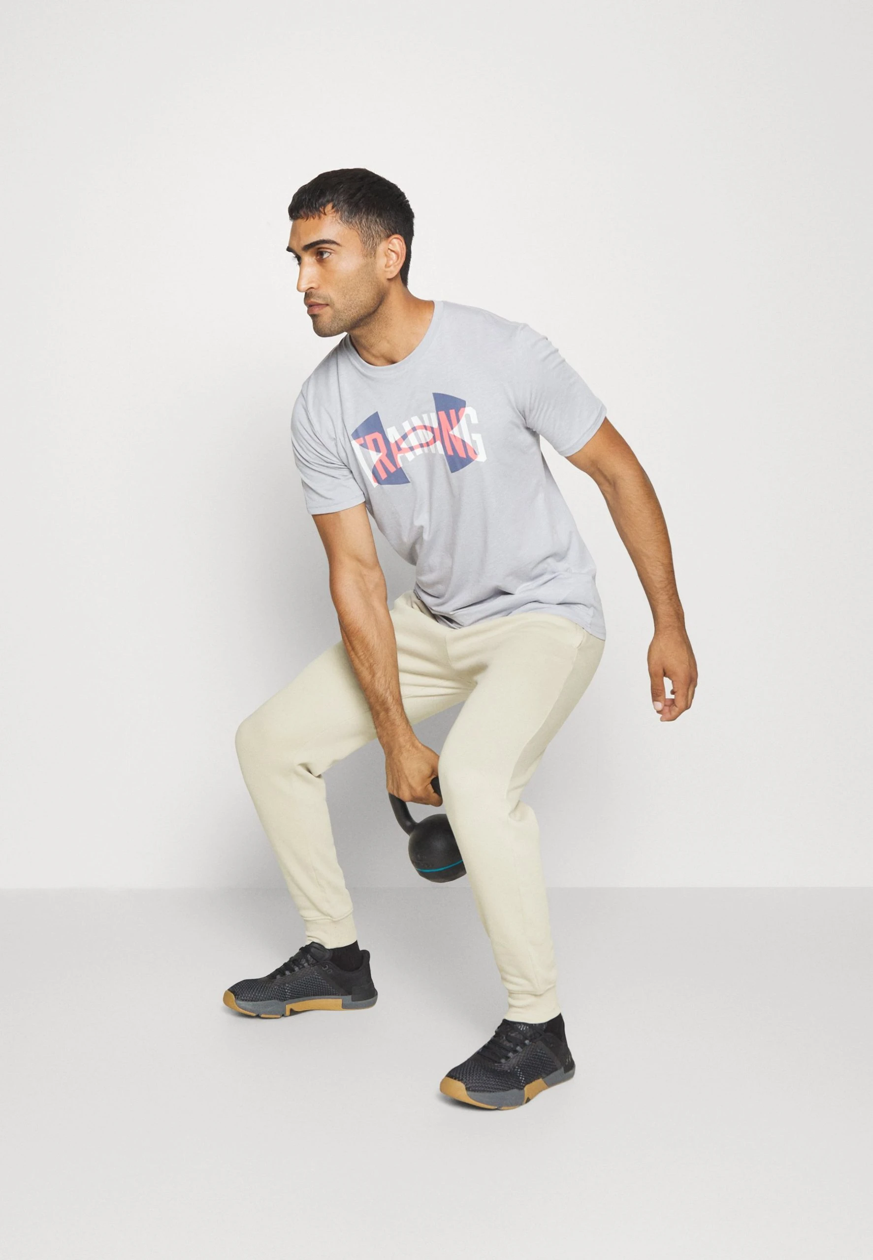 RIVAL JOGGERS - Spodnie treningowe - khaki base/onyx white Under Armour RIVAL JOGGERS - Spodnie Treningowe - Khaki Base/onyx White -Under Armour shop 7c137c9bd96f4003b77b34fcda2399bc scaled