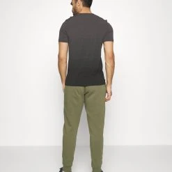 Under Armour RIVAL JOGGERS - Spodnie Treningowe - Marine Od Green/onyx White 7 Under Armour RIVAL JOGGERS - Spodnie Treningowe - Marine Od Green/onyx White -Under Armour shop 88f78ada46d24f488fef43f87e8ae6d9 scaled