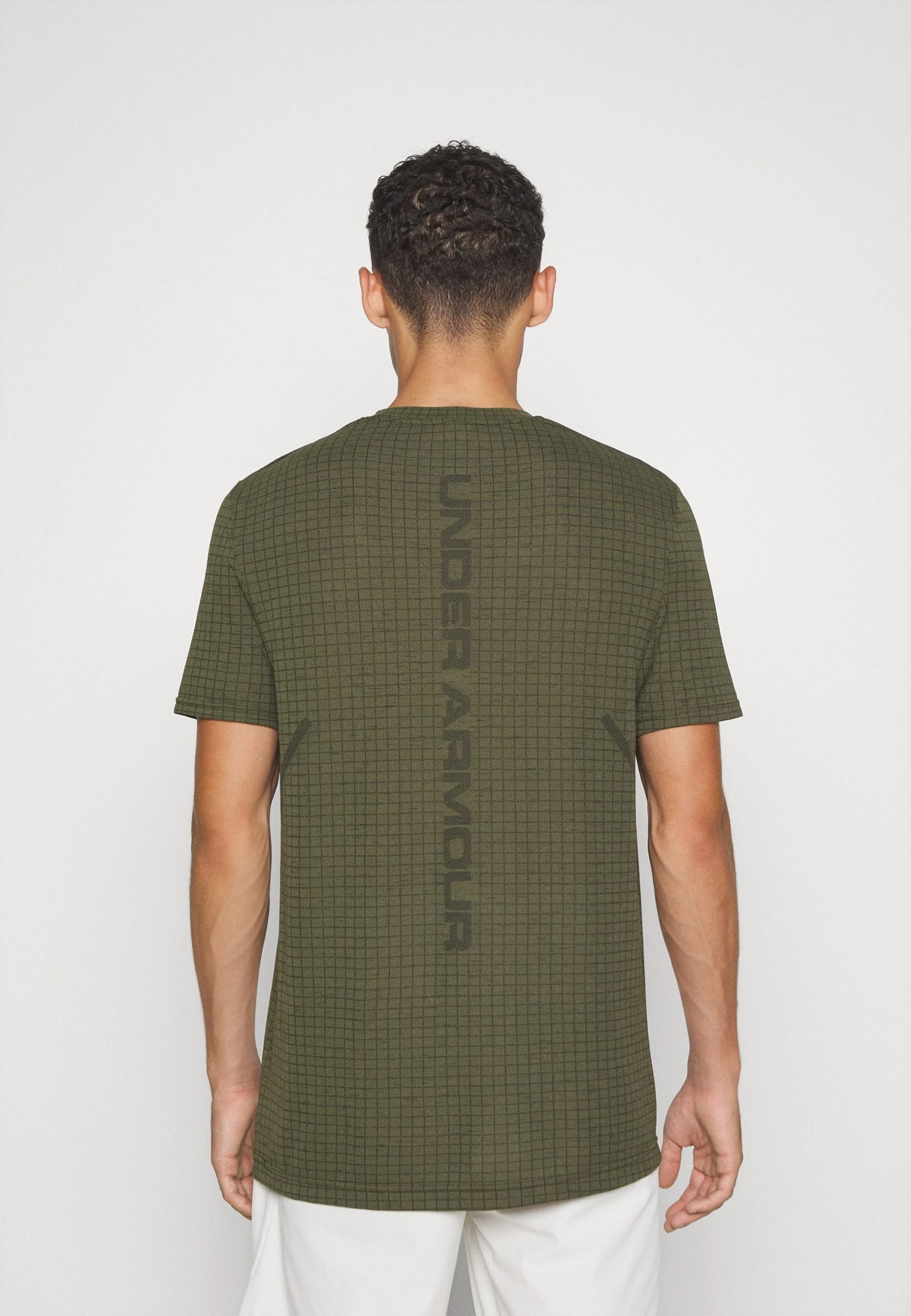 SEAMLESS GRID - Koszulka sportowa - marine green/black Under Armour SEAMLESS GRID - Koszulka Sportowa - Marine Green/black -Under Armour shop 90f8aea3b3224f97802f5eb7bebe390a scaled