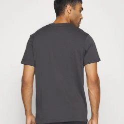 Under Armour LOGO HEAVYWEIGHT - T-shirt Basic - Jet Gray/rise -Under Armour shop a469b180d38e4458965cd8575e12eb91 scaled