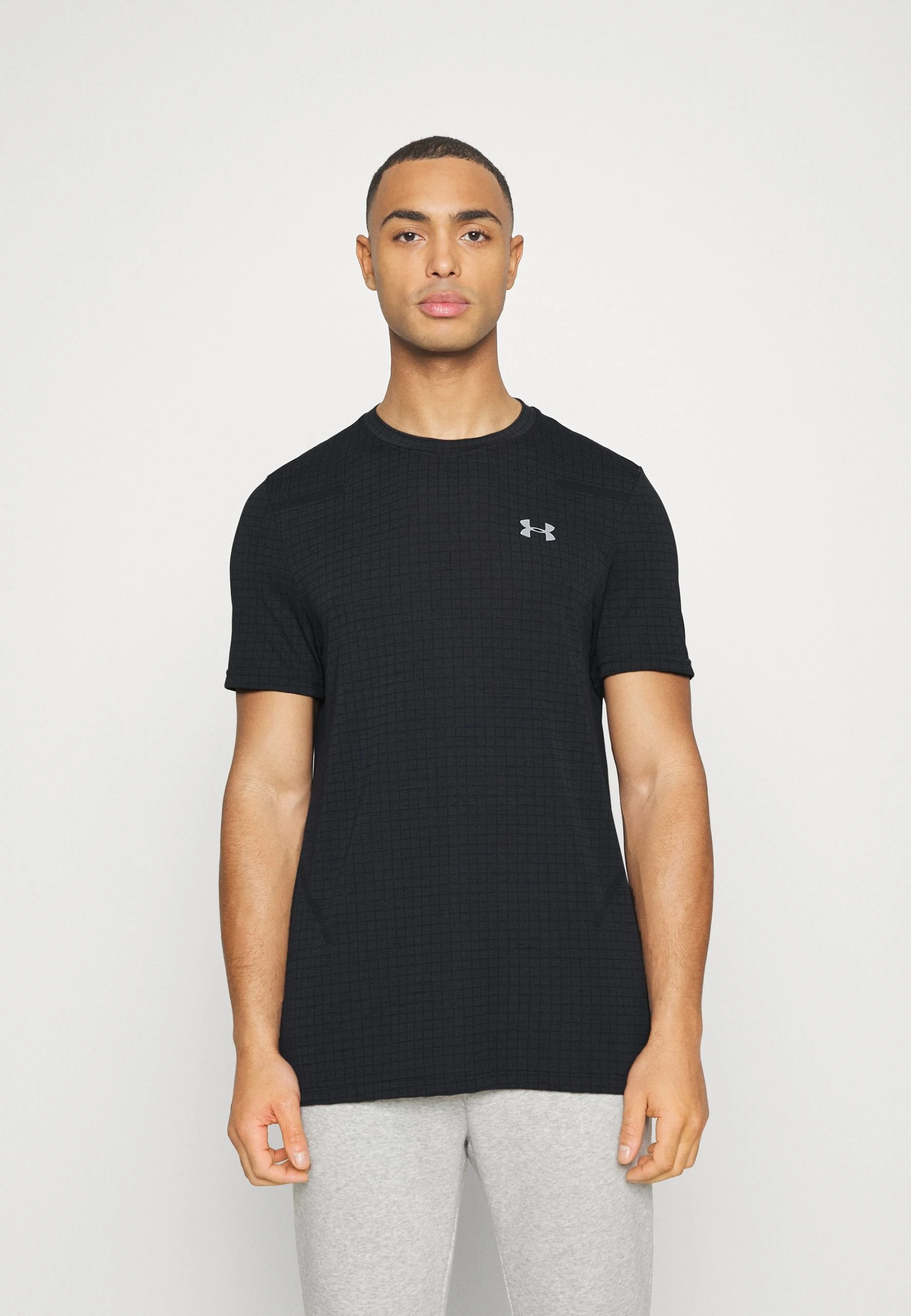 Under Armour SEAMLESS GRID - Koszulka Sportowa - Black/mod Gray 1 Under Armour SEAMLESS GRID - Koszulka Sportowa - Black/mod Gray
