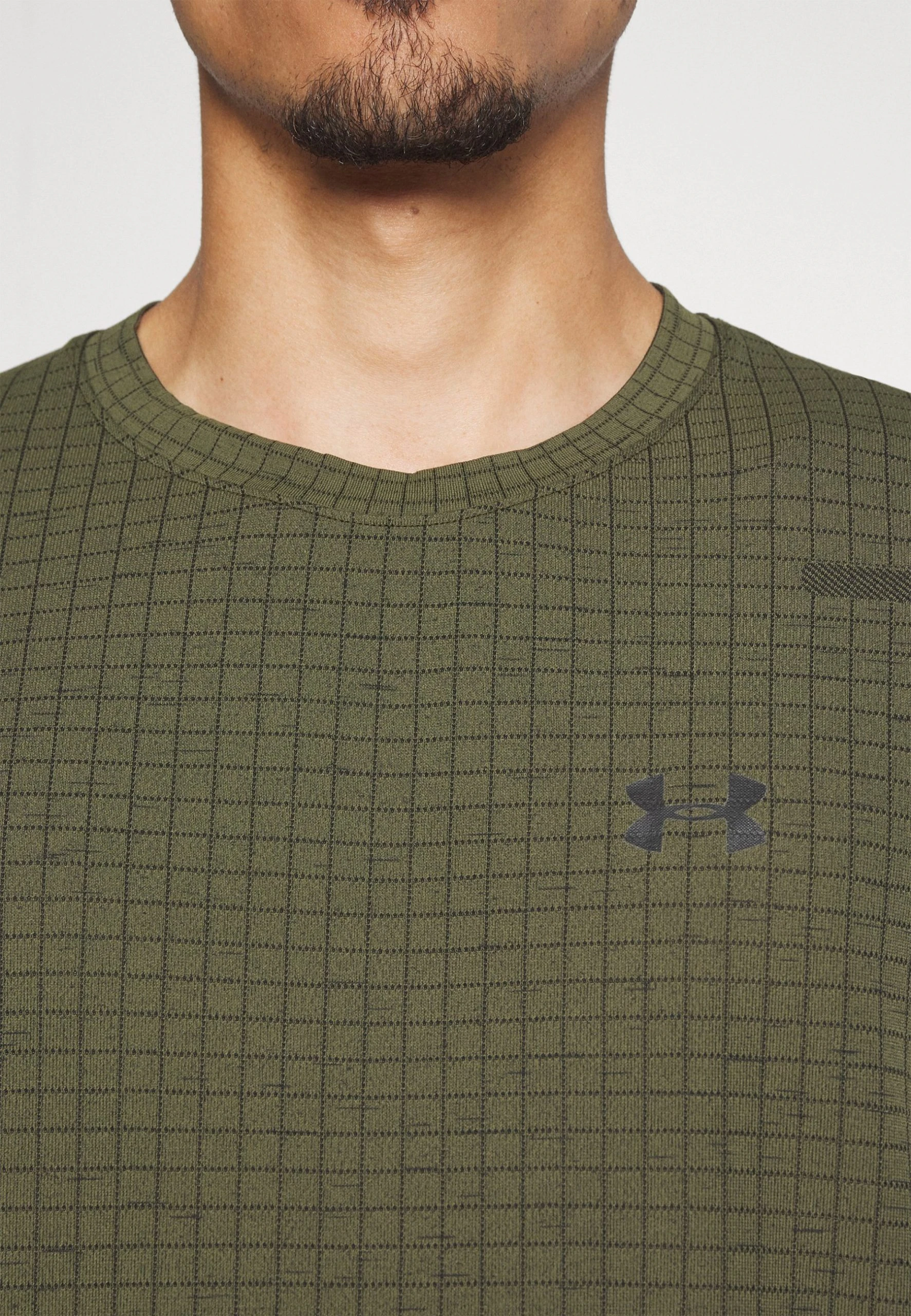 SEAMLESS GRID - Koszulka sportowa - marine green/black Under Armour SEAMLESS GRID - Koszulka Sportowa - Marine Green/black -Under Armour shop b4aa3b0763854ff2980344c18b45bbc4 scaled