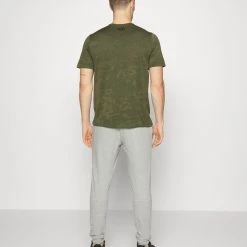 Under Armour TECH VENT JACQUARD SS - Koszulka Sportowa - Marine Od Green/black -Under Armour shop c548568b14824f0a8b3c63b1f6e8b219 scaled