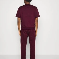 Under Armour TERRY - Spodnie Treningowe - Dark Maroon/deco Rose 2 Under Armour TERRY - Spodnie Treningowe - Dark Maroon/deco Rose -Under Armour shop cc0092bab9f047689ed7f043b37ab0fb scaled