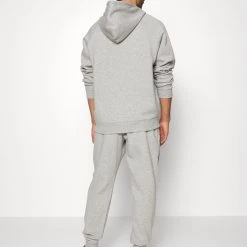 Under Armour RIVAL GRAPHIC JOGGER - Spodnie Treningowe - Gray Light Heather/black 2 Under Armour RIVAL GRAPHIC JOGGER - Spodnie Treningowe - Gray Light Heather/black -Under Armour shop e15516dca9574445b2abaf0b16c95b03 scaled