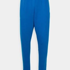Under Armour RIVAL JOGGERS - Spodnie Treningowe - Varsity Blue/white -Under Armour shop e1b2266d7f994ebebc45c43feb7c13a5 scaled