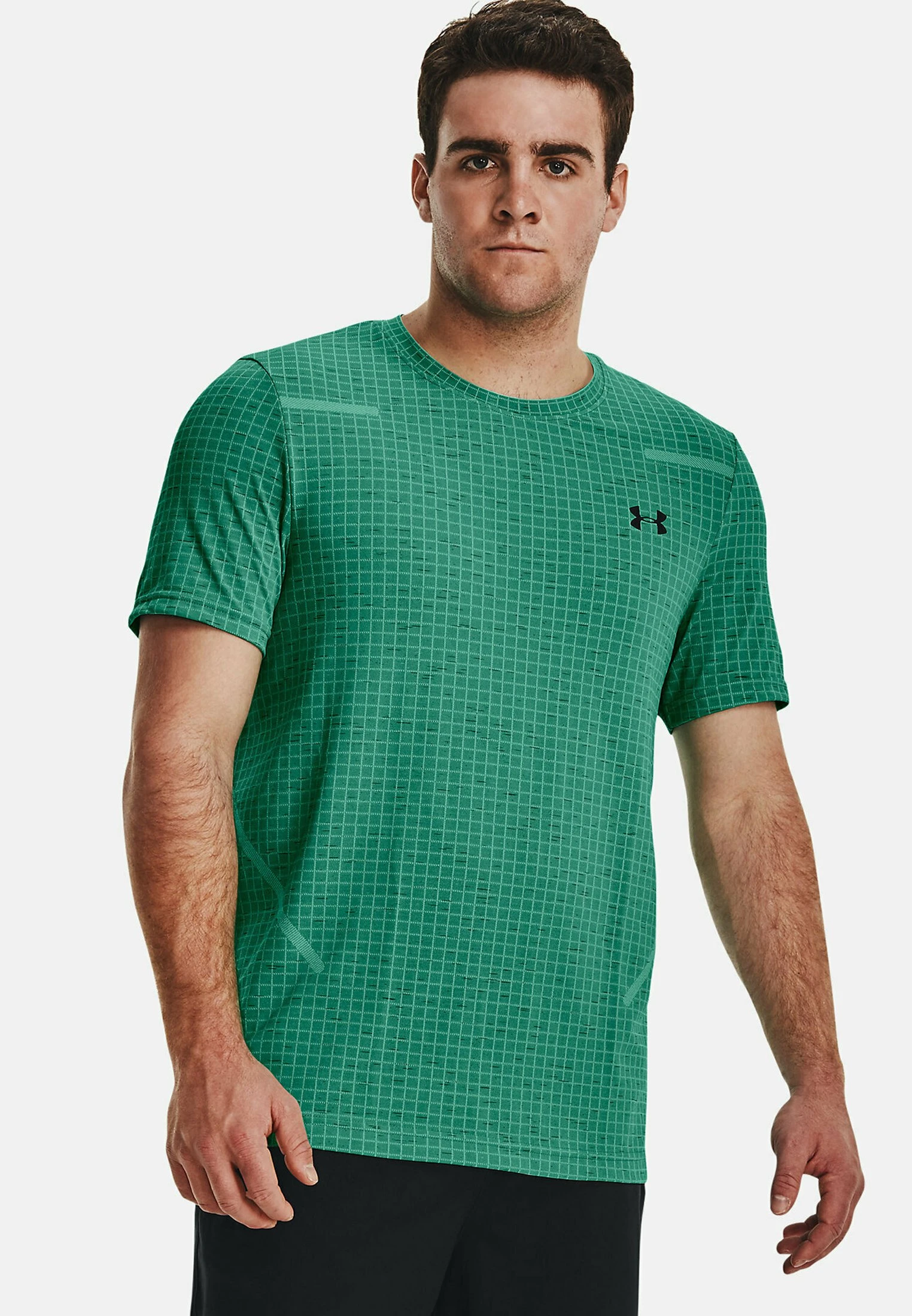 Under Armour SHORT SLEEVES UA SEAMLESS GRID SS - Koszulka Sportowa - Birdie Green 1 Under Armour SHORT SLEEVES UA SEAMLESS GRID SS - Koszulka Sportowa - Birdie Green