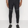 Under Armour STORM PANTS - Spodnie Treningowe - Black/pitch Gray