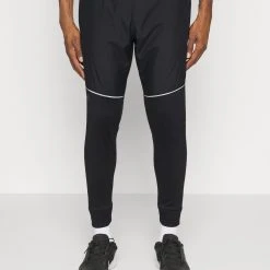 Under Armour STORM PANTS - Spodnie Treningowe - Black/pitch Gray