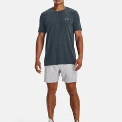 Under Armour SEAMLESS GRID - Koszulka Sportowa - Downpour Gray